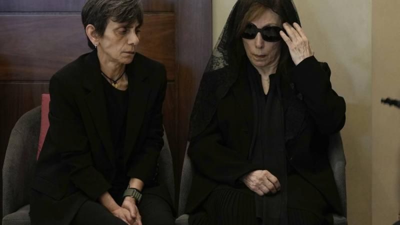 Lebanon's diva Fairuz, right, one of the Arab world's most popular singers and the mother of Ziad Rahbani, a visionary Lebanese composer, playwright, pianist and political provocateur, who died last Saturday at age 69, sits next to her daughter Rima as they receive condolences during Ziad Rahbani's funeral at a church in Bekfaya town, mount Lebanon, Monday, July 28, 2025. (AP Photo/Bilal Hussein) 9fabc0dd6e.jpg