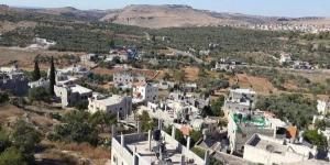 الاحتلال يحتجز أكثر من 20 مواطنا من بيت ريما ودير غسانة