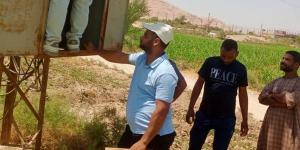 لرفع كفاءة شبكة الكهرباء، تجديد محولات واستبدال 20 عمودًا في أبوحزام بنجع حمادي (صور)
